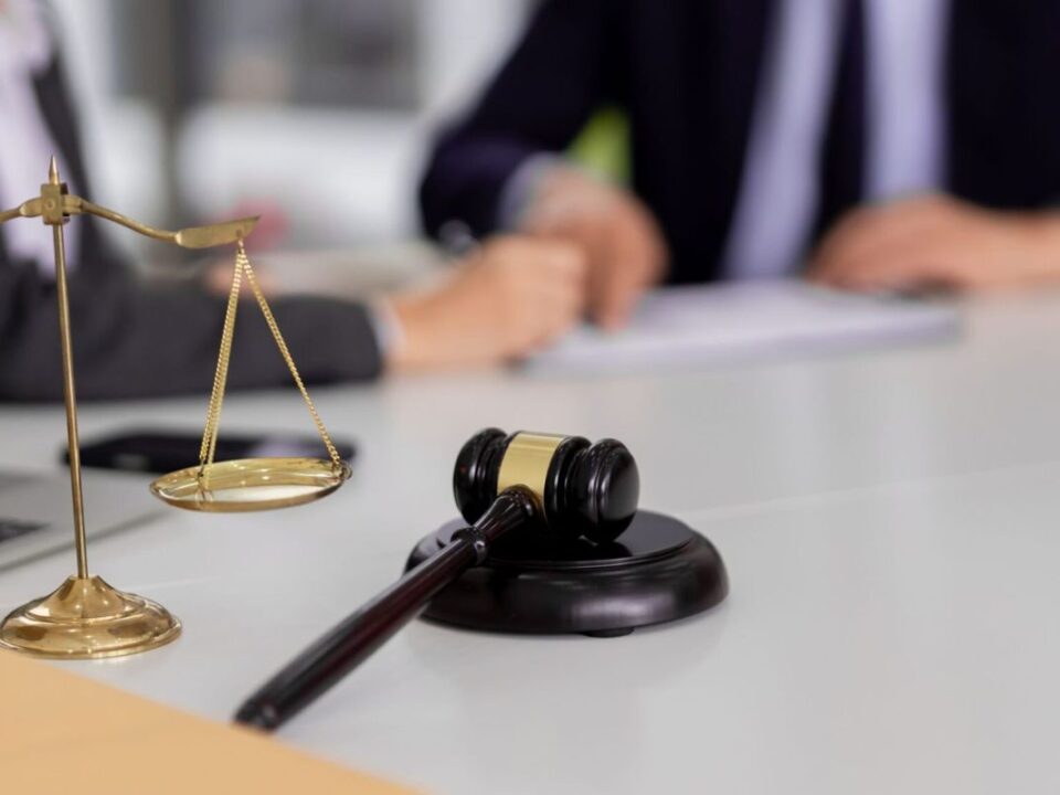 Lawyers reviewing a discrimination case in New York